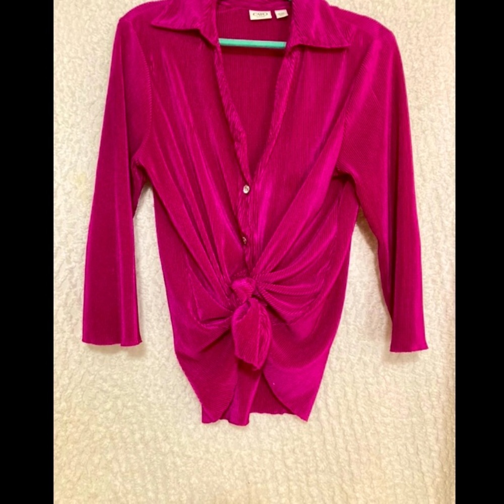 hopefully a mens shirt. it would look so good. pink 70s retro look shirt $9